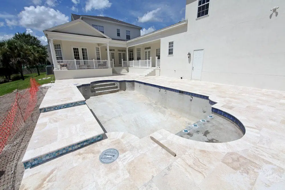 freshly installed stamped concrete pool deck in a residential property in Coral Gables FL