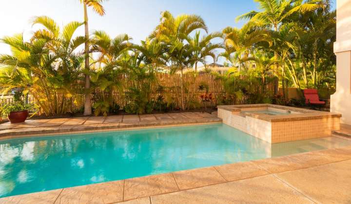 classic stamped concrete pattern is used to adorn this pool deck in Miami Beach